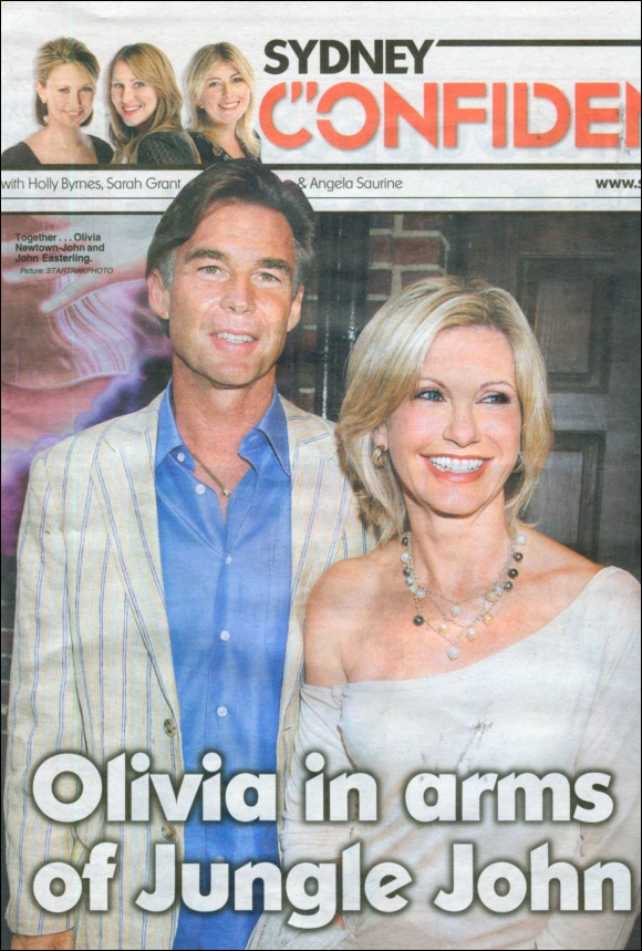 Olivia in arms of Jungle John - pic - Sydney Confidential